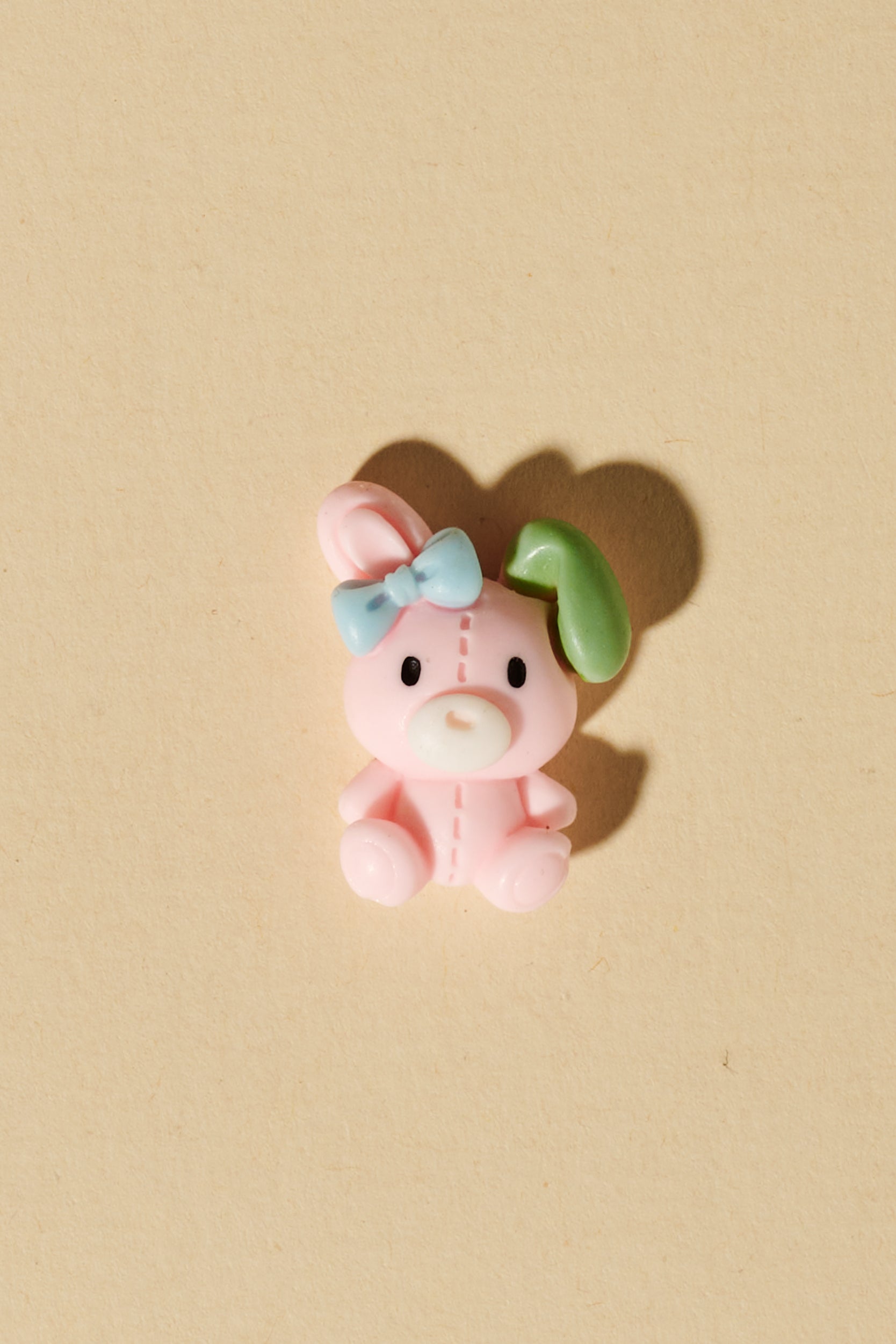Magic Braids Charms - Shufizoo - Pink Bunny Doll with a Green Ear and a Blue Bow