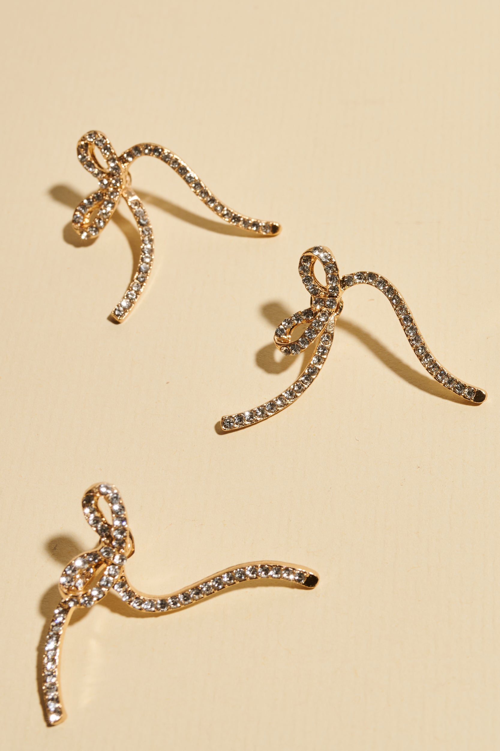 Braids decorations
- Shufizoo - Gold Earrings in a Unique Bow Shape with Zircons